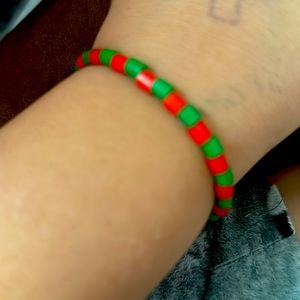 It’s kinda small but stretches Christmas bracelet